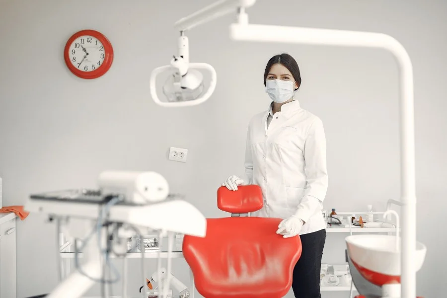 Dentist preparing a modern dental clinic for patient care